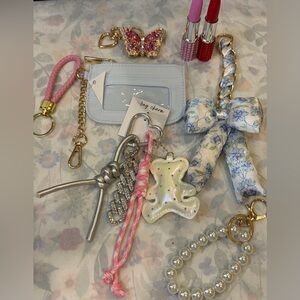 NWT 5 Keychains/Bag Charms and 2 gemmed lipsticks that are actually writing pens
